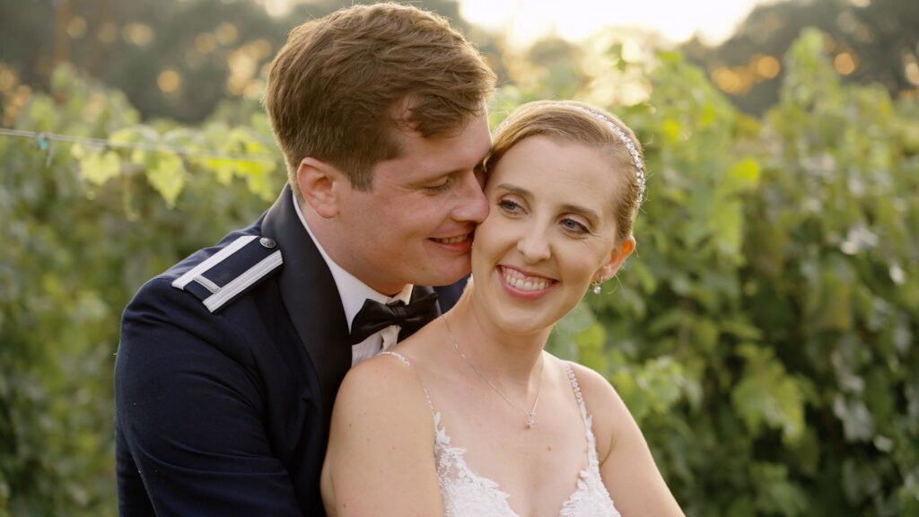 7 Vines Vineyard Wedding Bride and Groom Share Intimate Moment Between The Vines