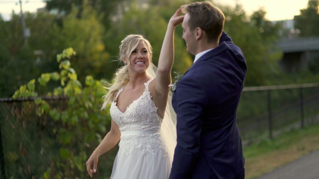 Minneapolis Five Event Center Wedding Bride and Groom Golden Hour Twirling