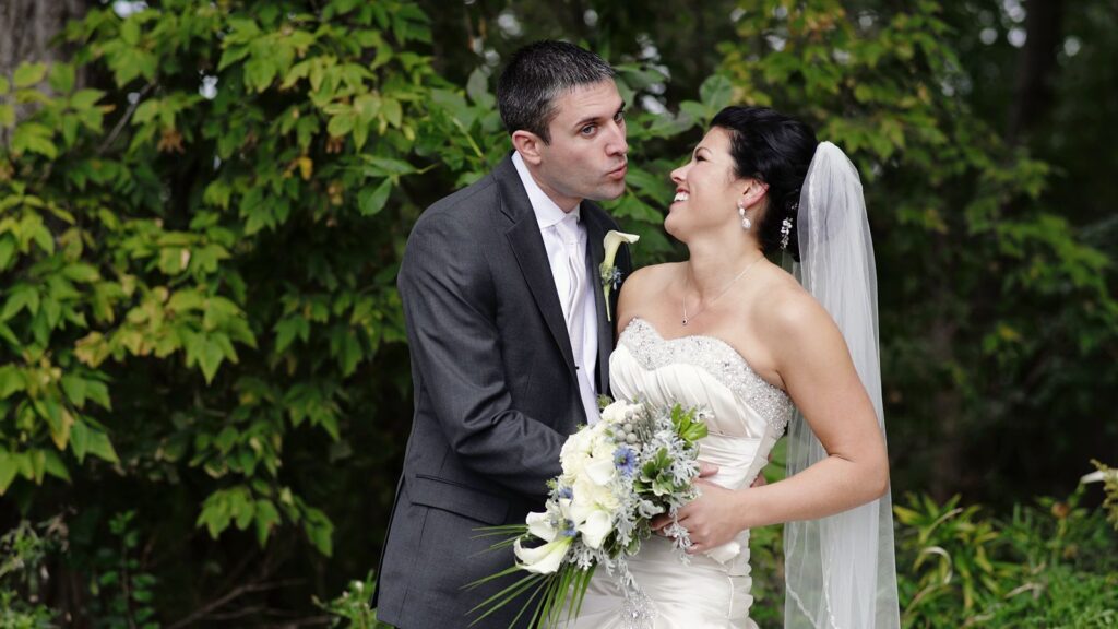 Minneapolis Radisson Blu Wedding Bride and Groom Share a Fun Moment during photo session
