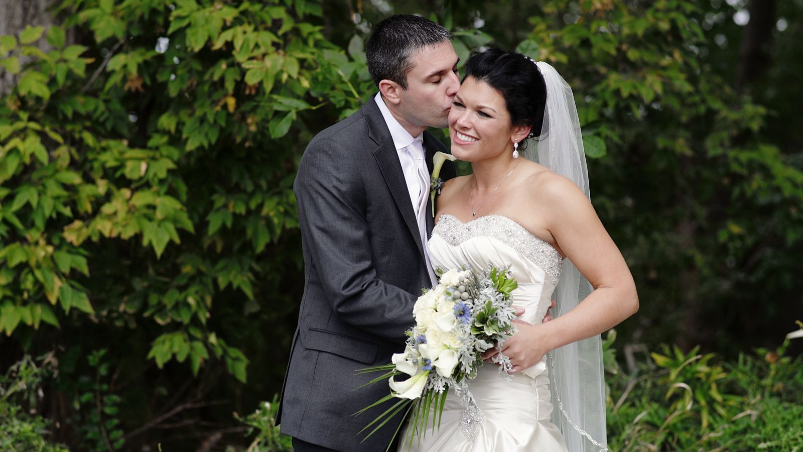 Minneapolis Radisson Blu Wedding Bride and Groom Posing For Couples Photo