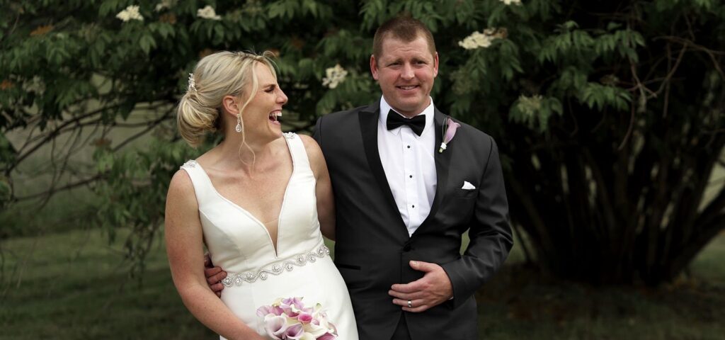 Bride and Groom Laughing at The Kelley Farm Wedding.