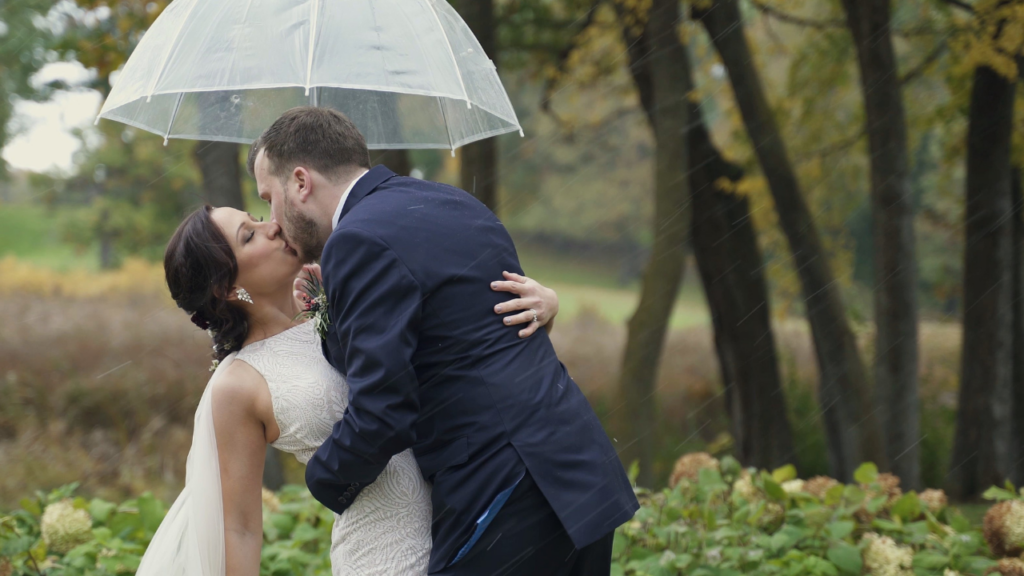 Bear Path Wedding Bride and Groom kiss outside during ice storm