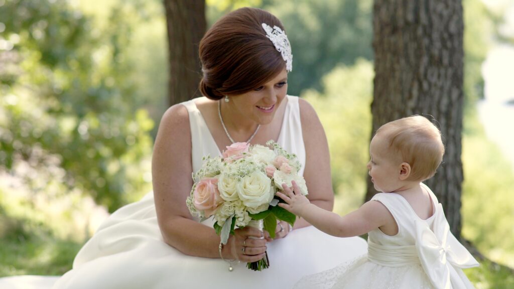 Mankato Old Main Village Wedding Bride and Flower Girl Sharig A Sweet Moment

