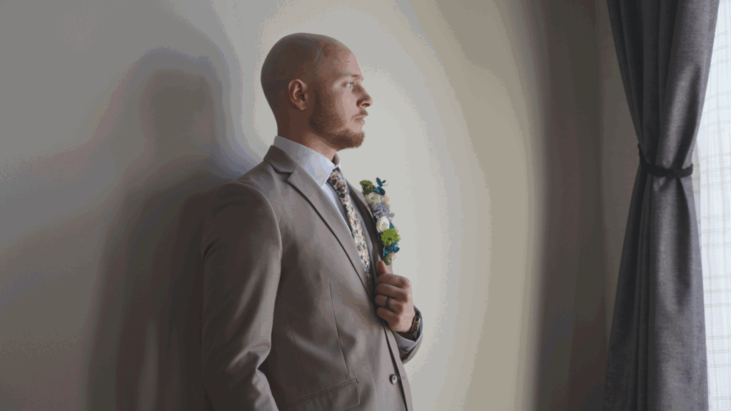 Is the confluence Hotel a good wedding venue groom looks out window