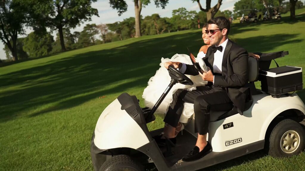 Bride and Groom riding a golf cart to their ceremony location at Oak Ridge Country Club Wedding